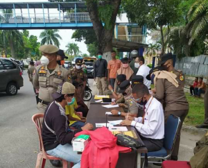Bandel, Pelanggar Protkes Dihukum Denda di Riau